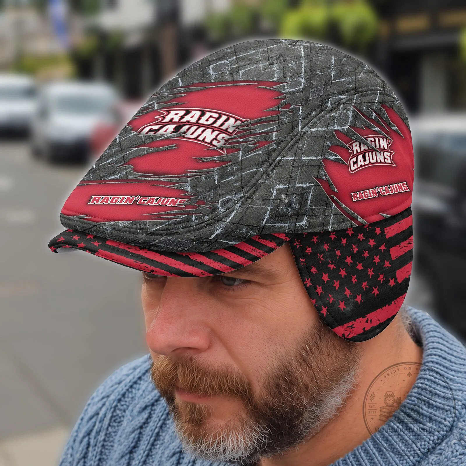 NCAA Flat Cap Featuring Foldable Ear Flaps - Louisiana Ragin Cajuns Design