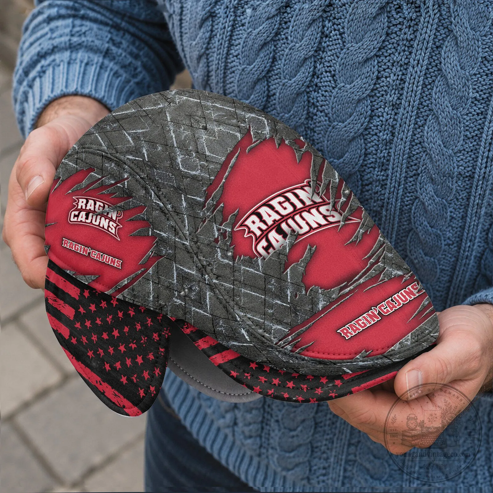 NCAA Flat Cap Featuring Foldable Ear Flaps - Louisiana Ragin Cajuns Design 6 NCAA Flat Cap Featuring Foldable Ear Flaps - Louisiana Ragin Cajuns Design