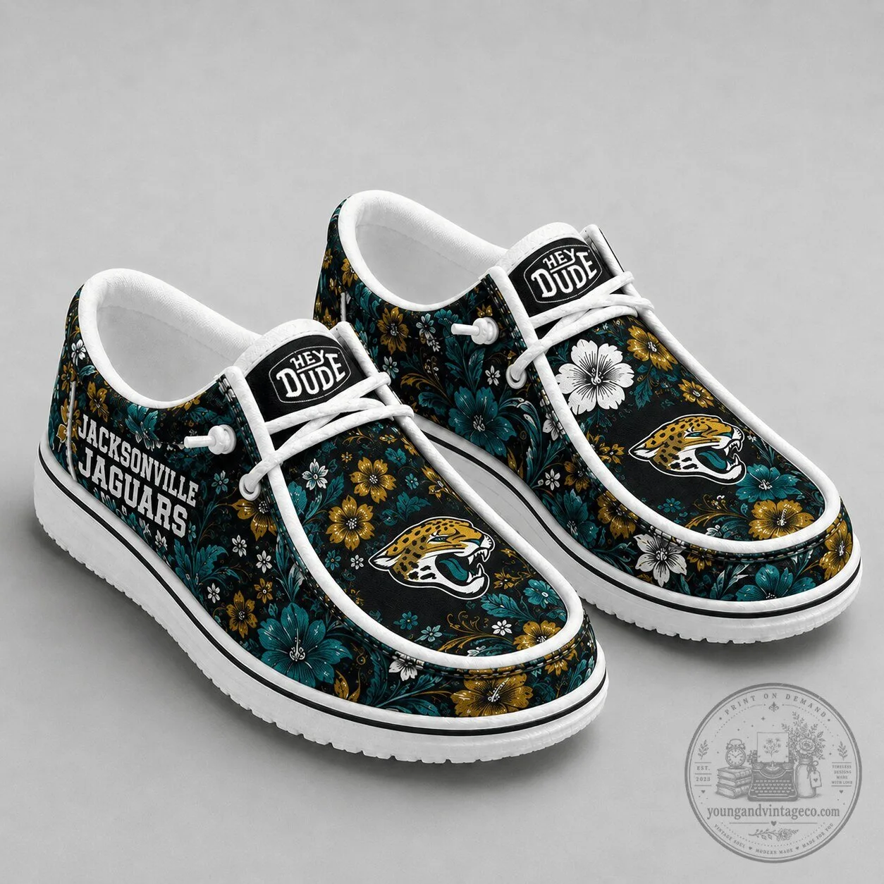 Jacksonville Jaguars NFL Team Floral Pattern Casual Loafer Shoes